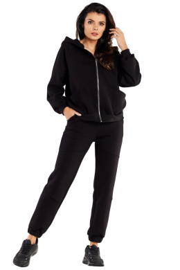 Spodnie damskie dresowe luźne z gumą w pasie i kieszeniami czarne M325